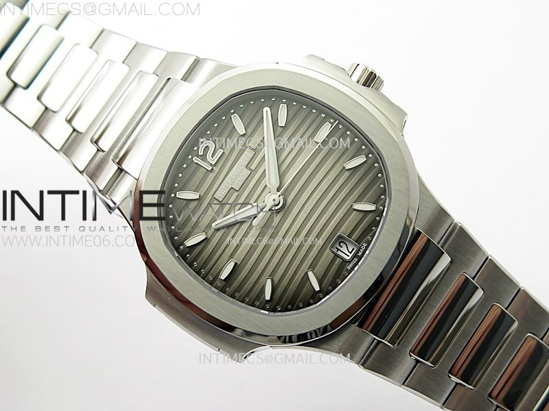 nautilus-7118-new-version-ladies-diamonds-bezel-ppf-1-1-best-edition-white-dial-on-ss-bracelet-a324-super-clone (1).jpg