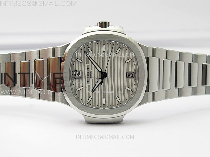 nautilus-7118-new-version-ladies-diamonds-bezel-ppf-1-1-best-edition-white-dial-on-ss-bracelet-a324-super-clone (1).jpg